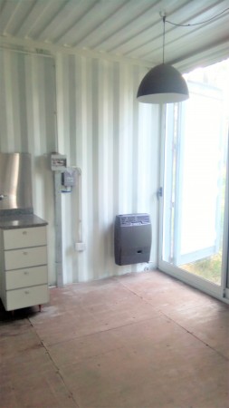 CASA DE 1 DORMITORIO FRENTE AL GOLF - EN VENTA