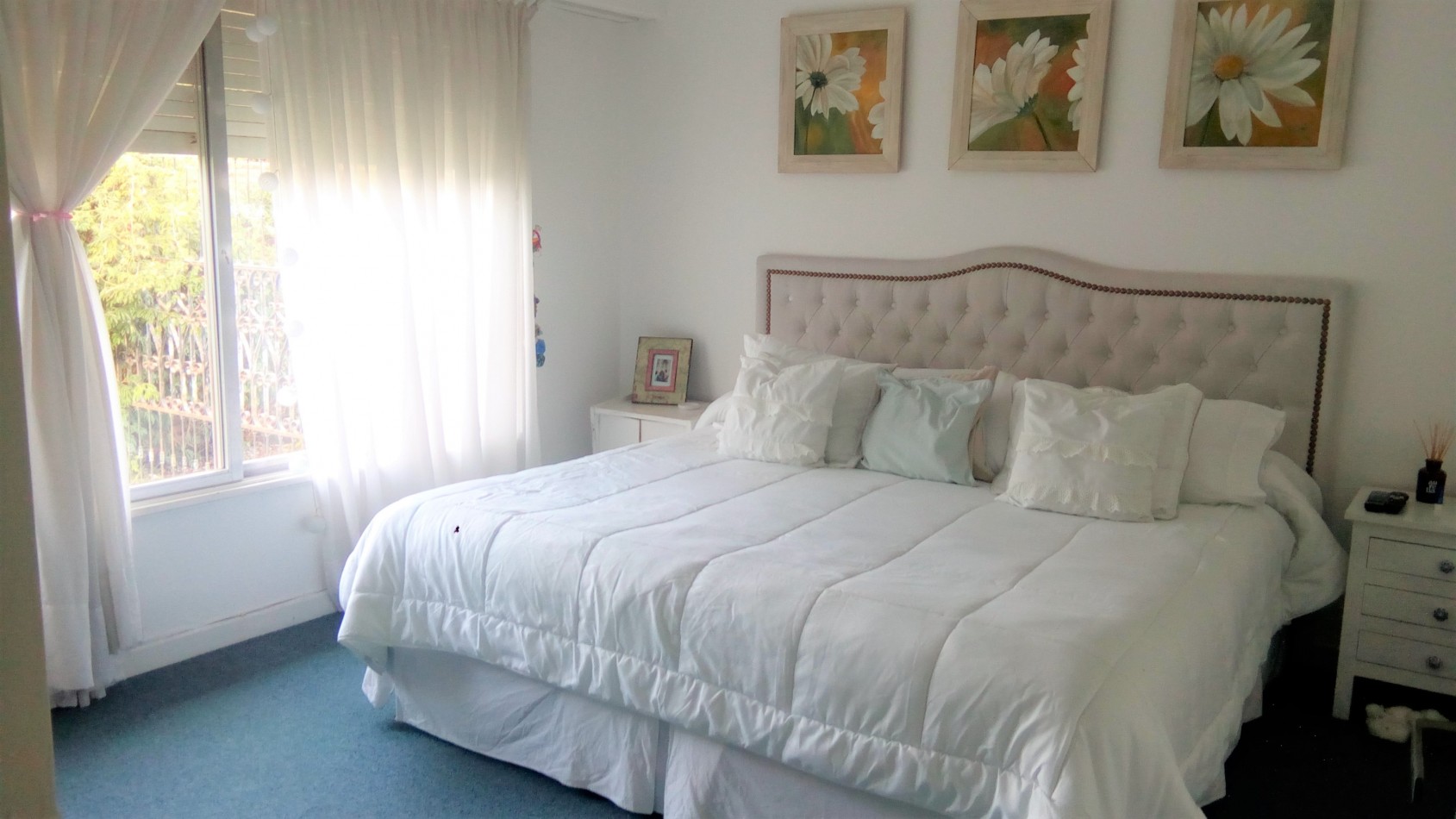CASA CENTRICA DE TRES DORMITORIOS con JARDIN - EN ALQUILER
