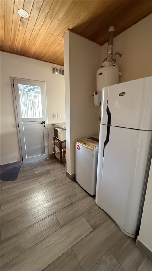 DEPARTAMENTO DE 1 DORMITORIO - CON PATIO Y COCHERA